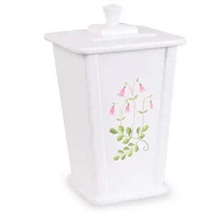 Rektangulär vit keramikbehållare med lock, med rosa och grönt blommönster på framsidan.